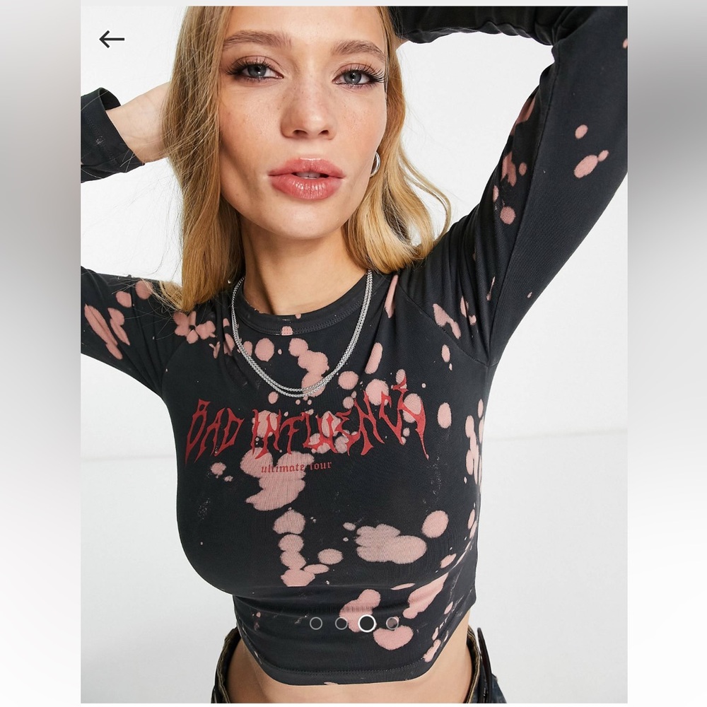 Asos design bleached long sleeve top with bad influence graphic
